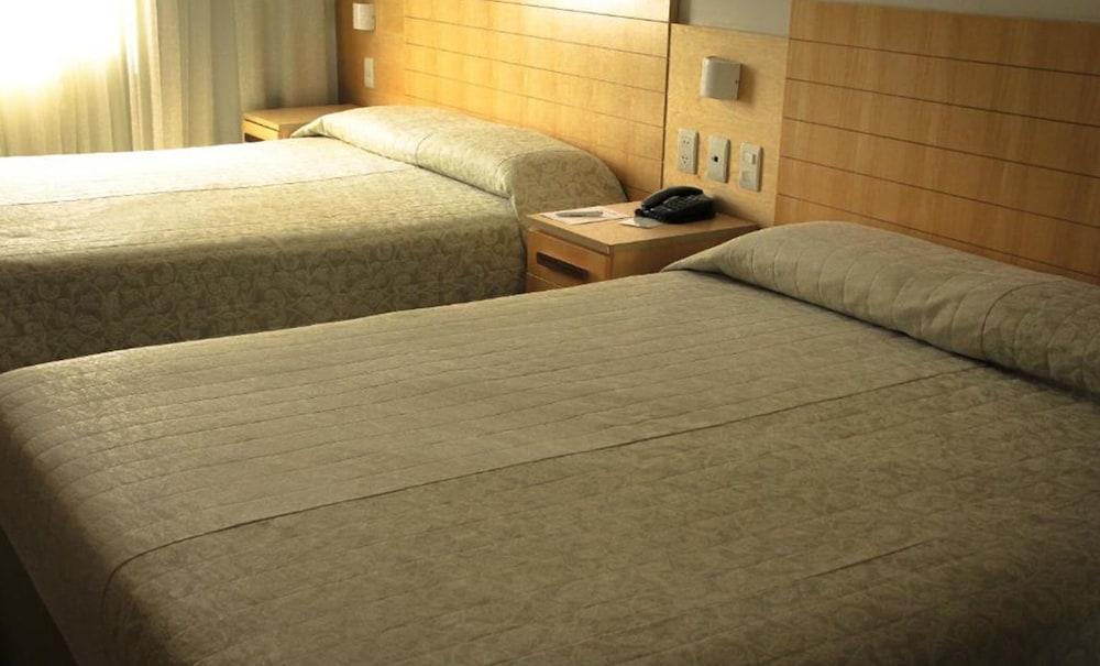 Hotel Atlantico Tower Rio de Janeiro Exterior photo Two beds in a hotel room